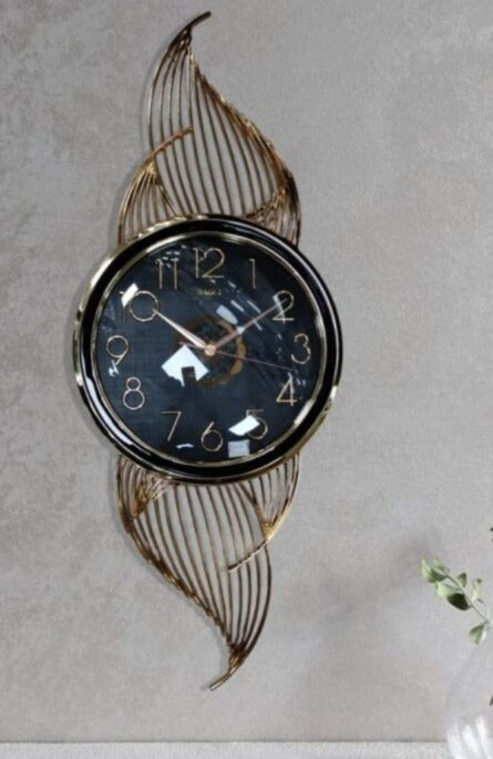 "Golden Aura – Premium Metal Wall Clock"||33X82CM